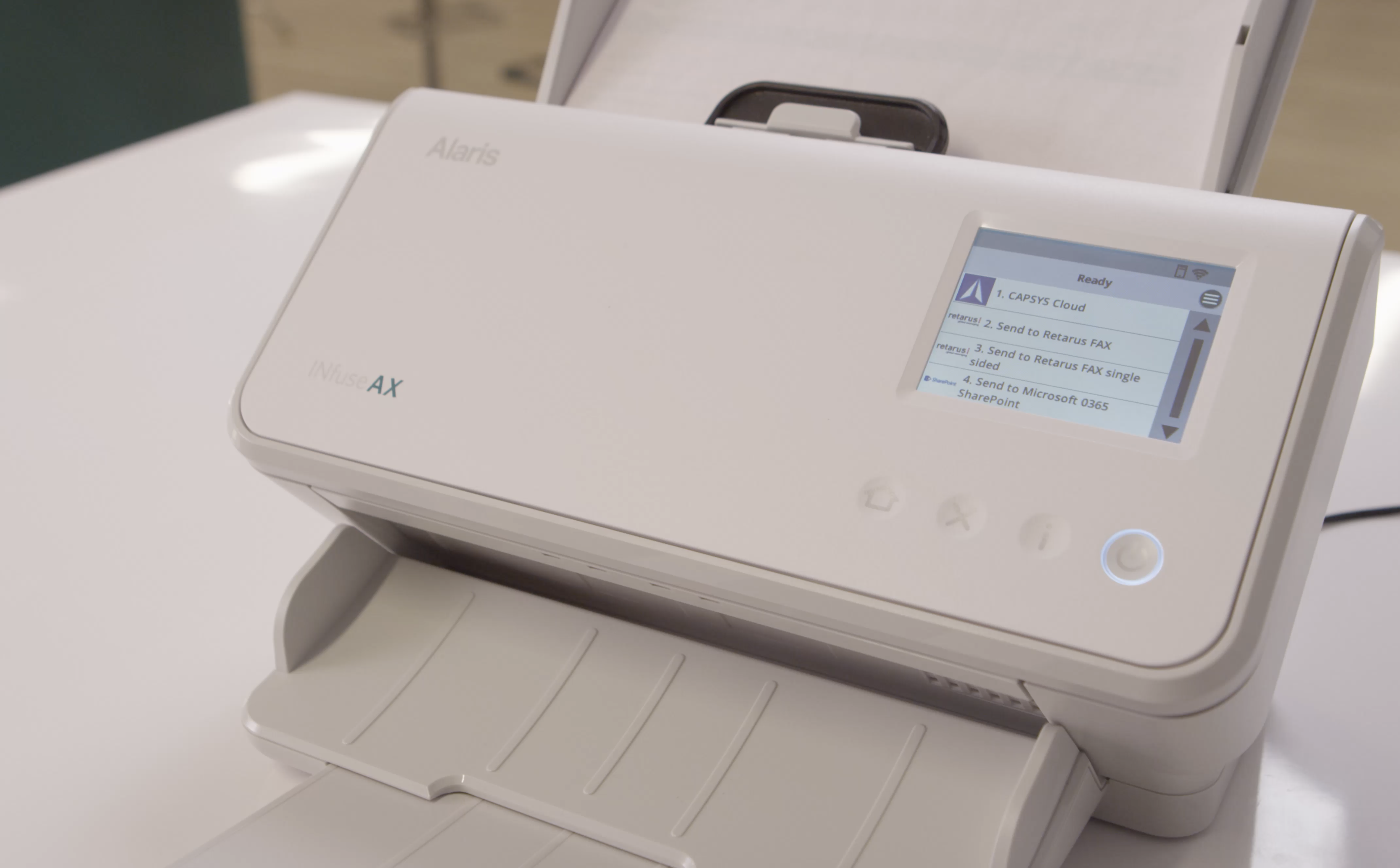 A Kodak Alaris INfuse device with fully integrated Retarus "Scan to Fax" solution.
